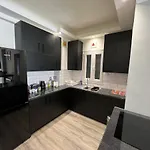 In Apartment *